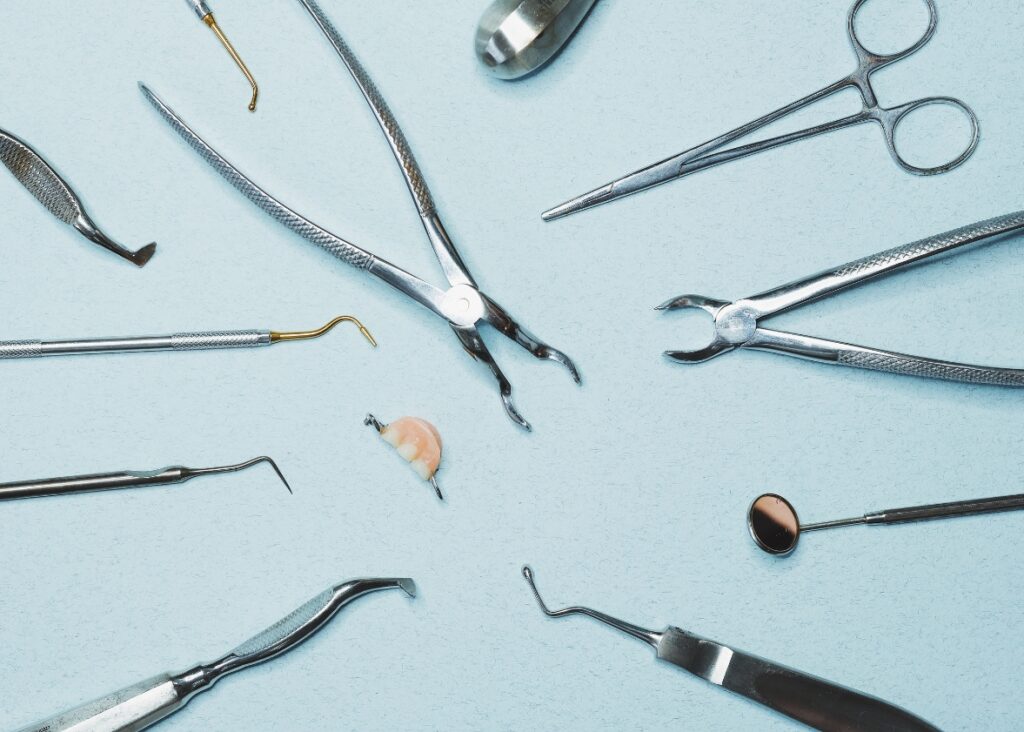 A set of dental tools used for professional teeth cleaning, ensuring every detail of oral health is addressed.