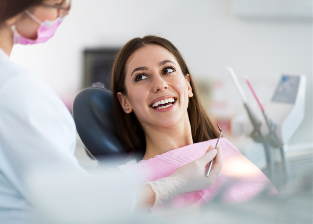 Cosmetic dentist in West Palm Beach discussing treatment plan with a patient
