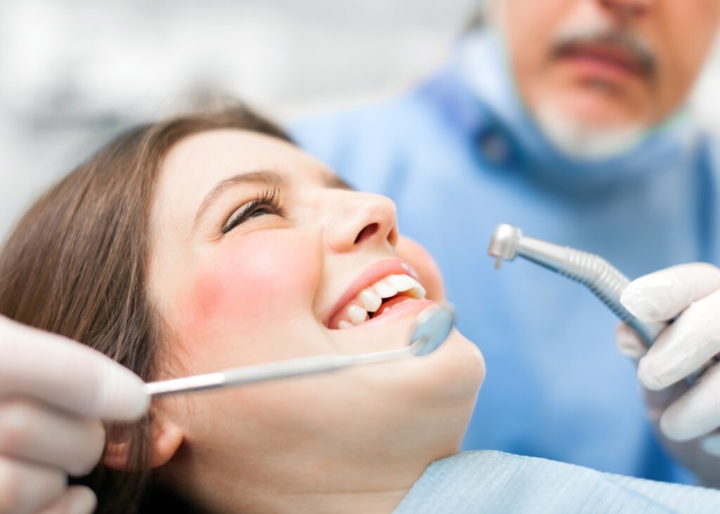 Advanced dental treatment being performed by skilled dentist at Palm Beach Dental Specialists